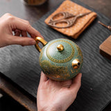 Hand-made purple clay pot home guest ball hole filter Xishi tea pot single cup kung fu tea set