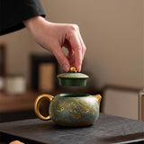 Hand-made purple clay pot home guest ball hole filter Xishi tea pot single cup kung fu tea set